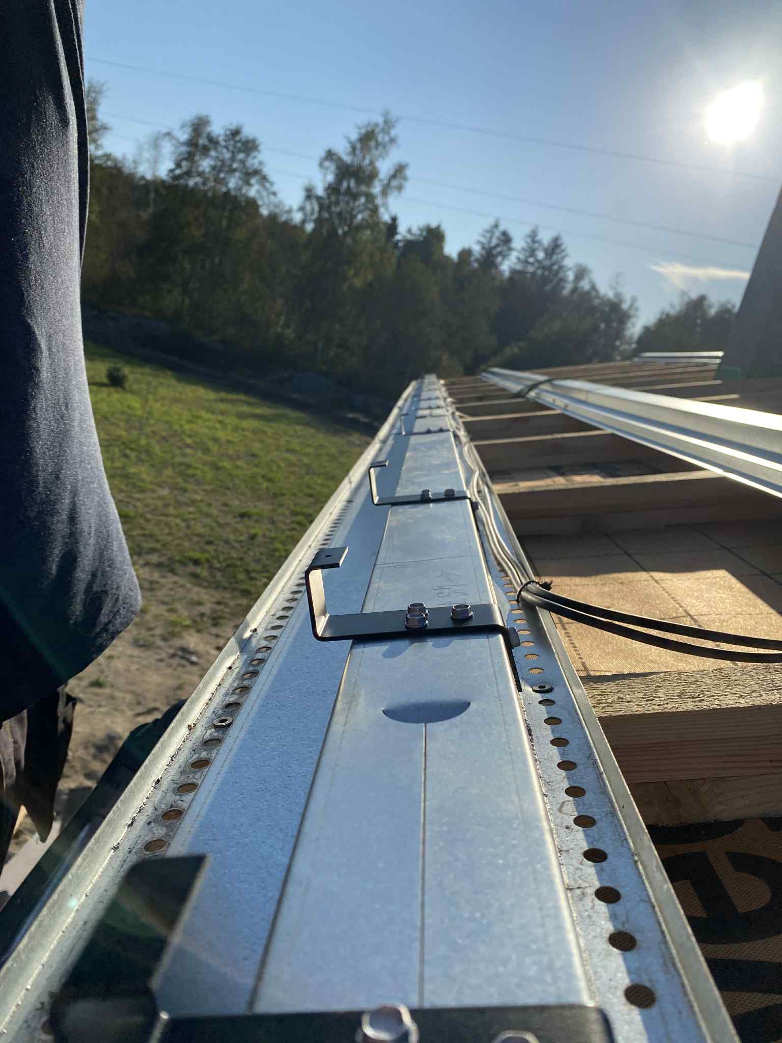 Detail shot of HolaRoof metal batten system and installation hardware